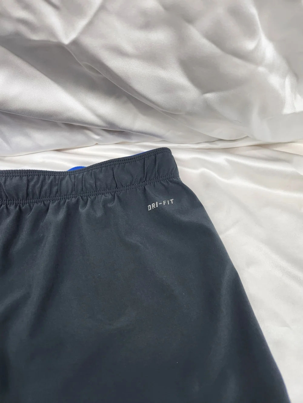 Nike Black Running Shorts with Blue Accent